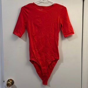 Everlane red short sleeve top with bottom snaps, size small